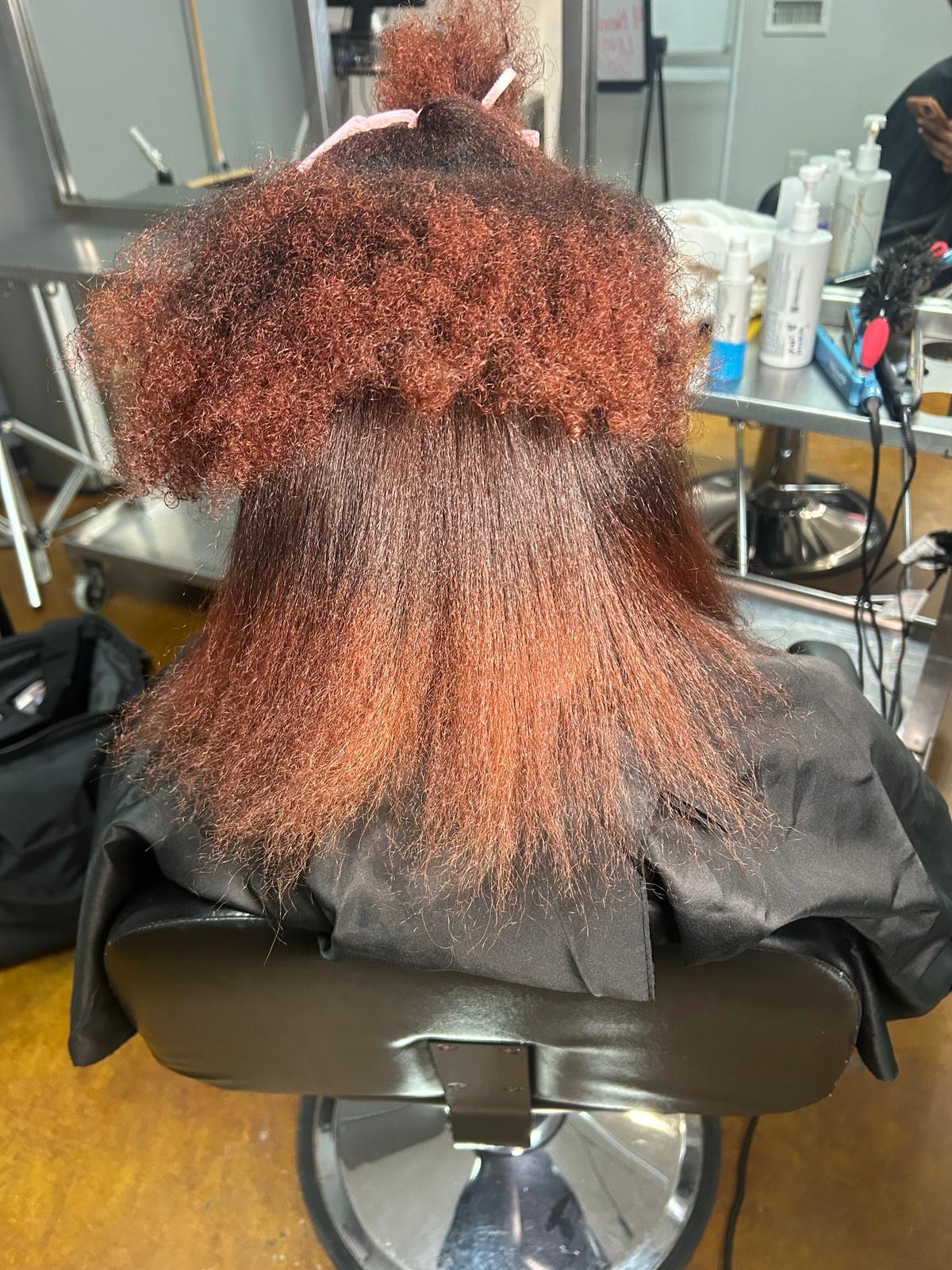 Silk press styling in progress